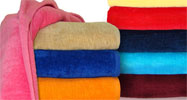 32x64 Terry Velour beach towels by Royal Comfort (assorted colors). 16.0 Lbs/Dz, 100 % Ring Spun cotton. 24 pcs per case.